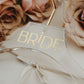 Customizable acrylic wedding dress hanger with name in gold, silver, white, black, rose gold, or champagne