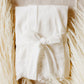 A beautiful velvet robe with lace sleeves, ideal for the bride to wear while preparing for her wedding.