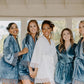 A truly decadent velvet bridesmaid robe, with lace sleeve embellishments, offering a spa-like experience