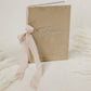 Champagne velvet vow book, embossed 'vows', with customizable ribbon spine ties
