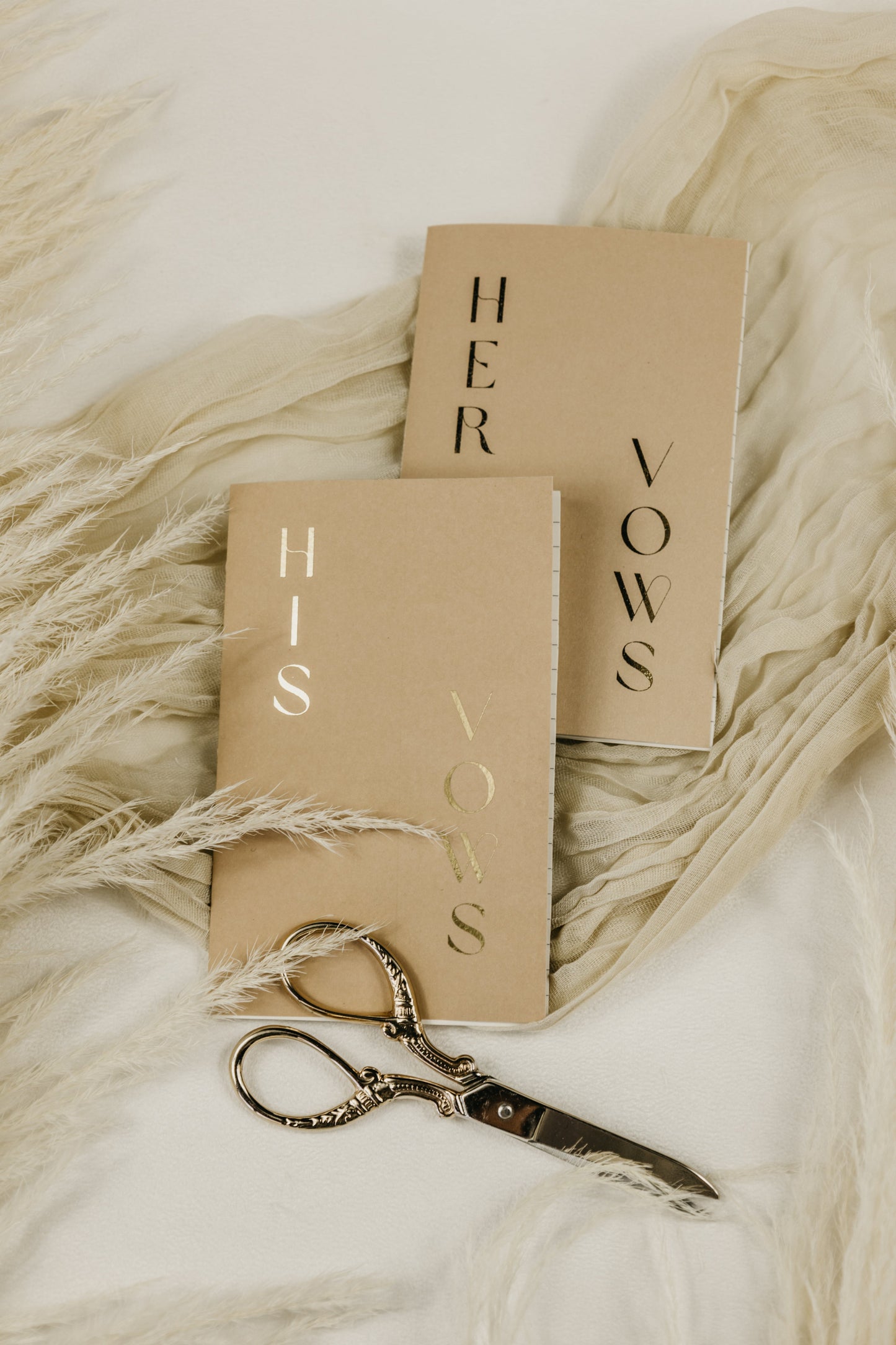 Custom vow books, 3.5" wide and 5.5" tall, with foiled names and date, handmade with a soft touch cover