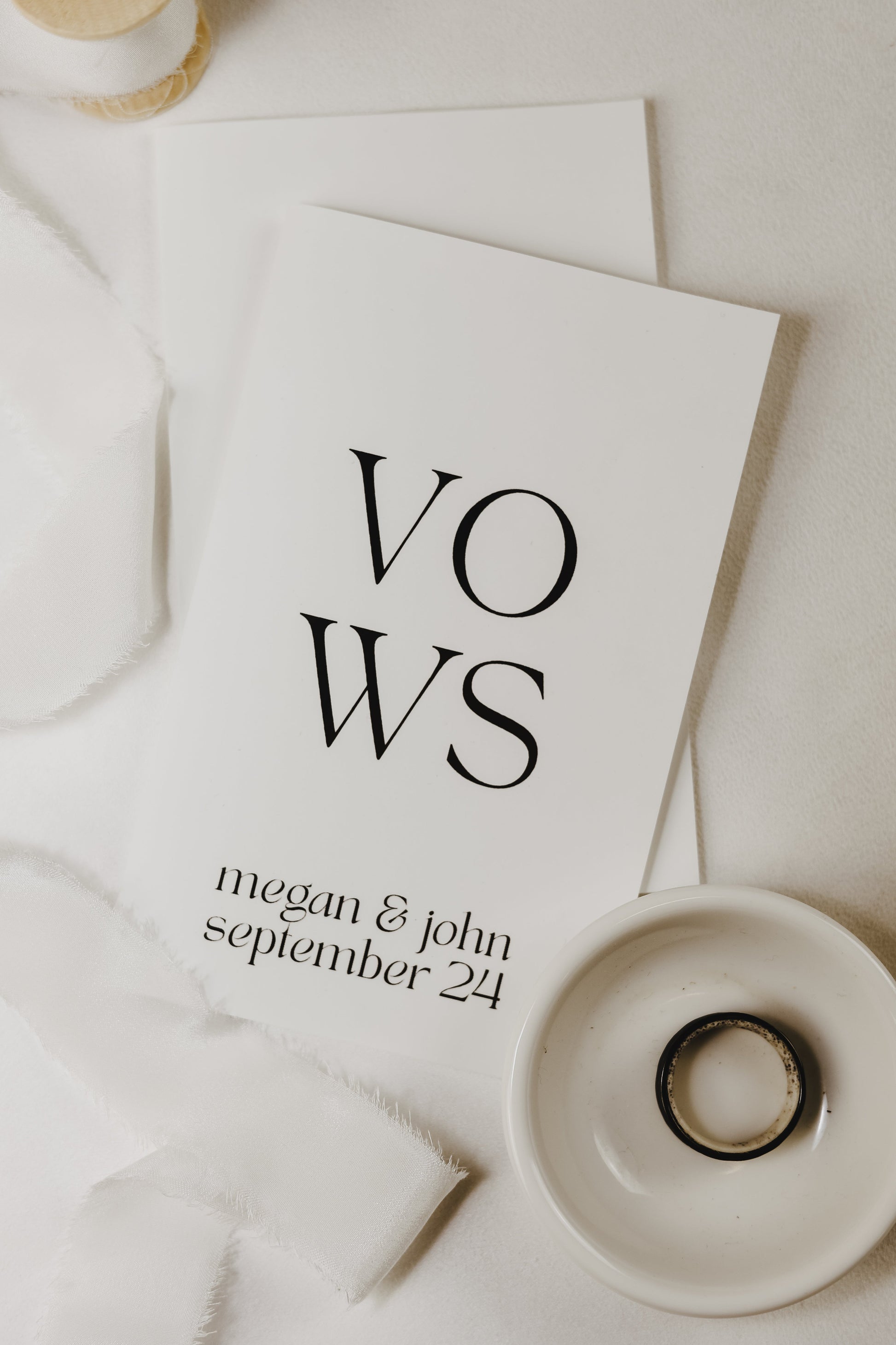 Elegant, pocket-sized vow books with personalized text, handmade for wedding ceremonies