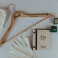 Make It Match with Personalized Gifts like a Ring Box Wedding Dress Hanger and Vow Books to Write Your Promises