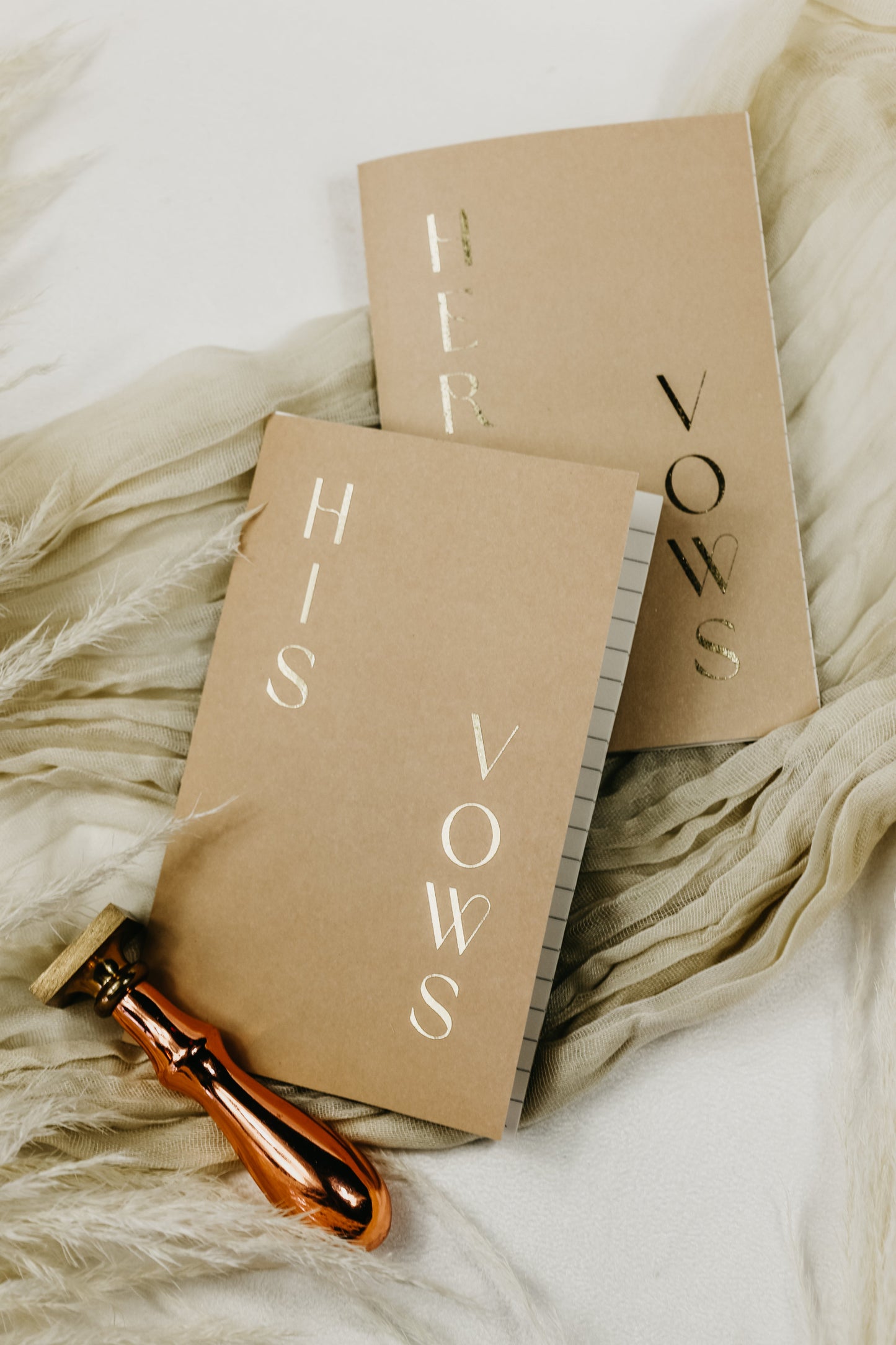 Personalized vow books, handmade, pocket-sized (3.5"x5.5"), with foiled bride and groom names and wedding date