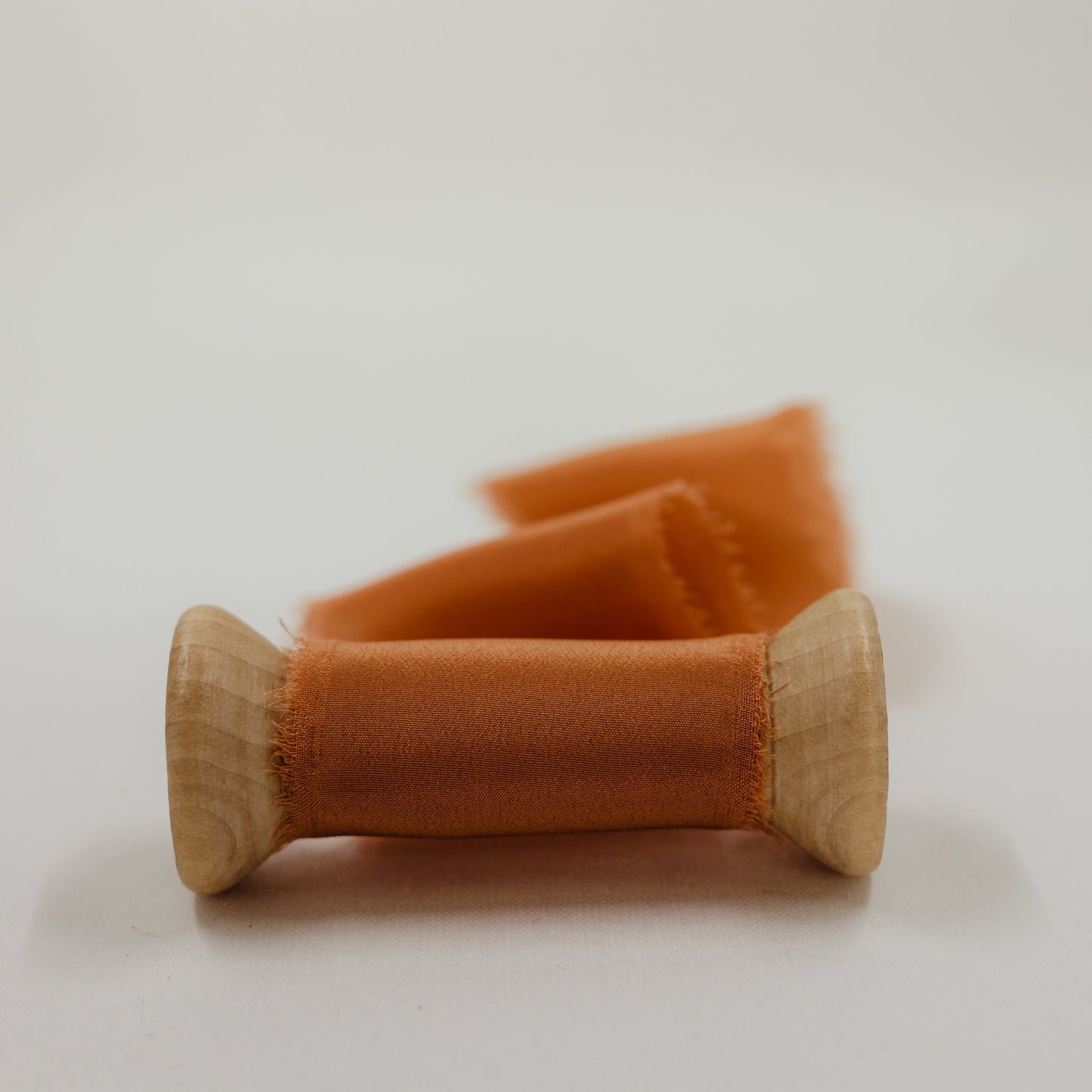 Rust color ribbon for wedding invitations