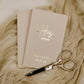 Pocket-sized, personalized vow books (3.5"x5.5") with foiled text, showing bride and groom names and wedding date