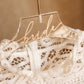 Personalized acrylic wedding dress hanger with gold name, a thoughtful gift for the bride
