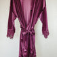 Pamper your bridesmaids with this plush velvet robe, enhanced by exquisite lace sleeve accents