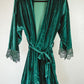 This plush velvet robe with lace detailing offers bridesmaids a moment of luxury and relaxation