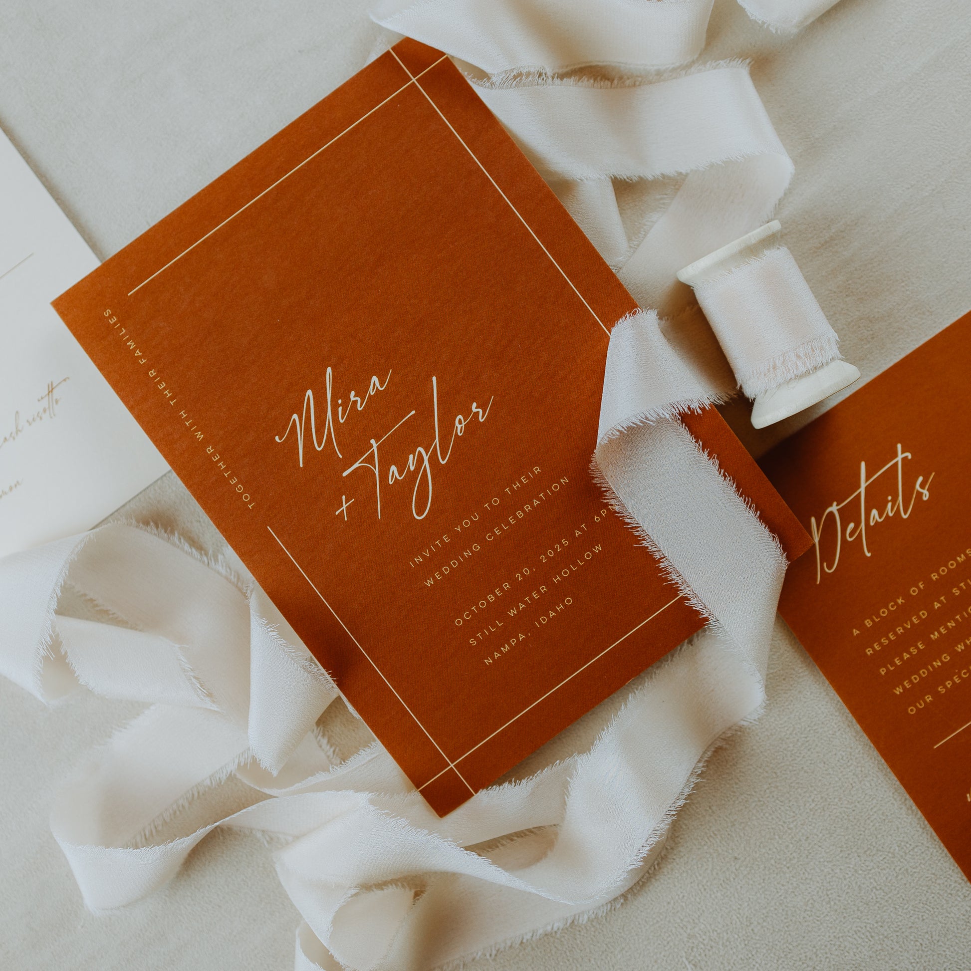 Artisan handmade silk ribbon with a raw edge, perfect for accentuating wedding ring boxes in flat lay styling